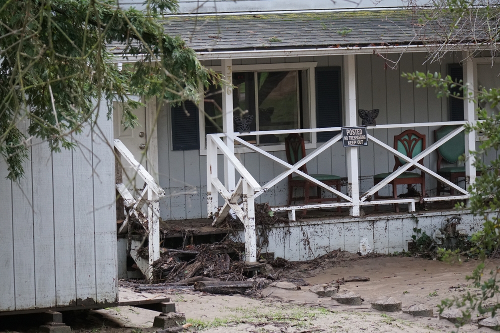 Felton, California, USA. January 9, 2023. A storm damaged home surrounded by mud due to torrential rain.