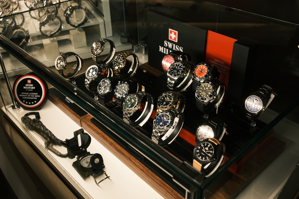 A display of Swiss Military watches with various designs and colors in a glass case, highlighting precision and luxury. DUTY FREE at an airport. Istanbul, Turkey - 1.03.2025