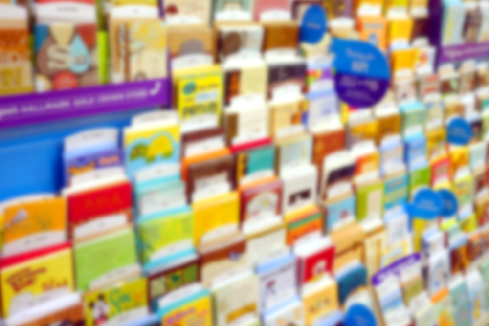 Blurred greeting cards display at a store