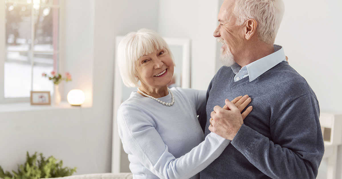 Grandparents dancing together