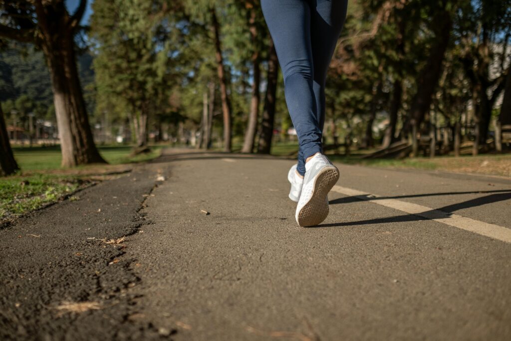 oman jogging along a tree-lined path, similar to the routes where Surrey's undercover officers conducted their harassment patrols.
