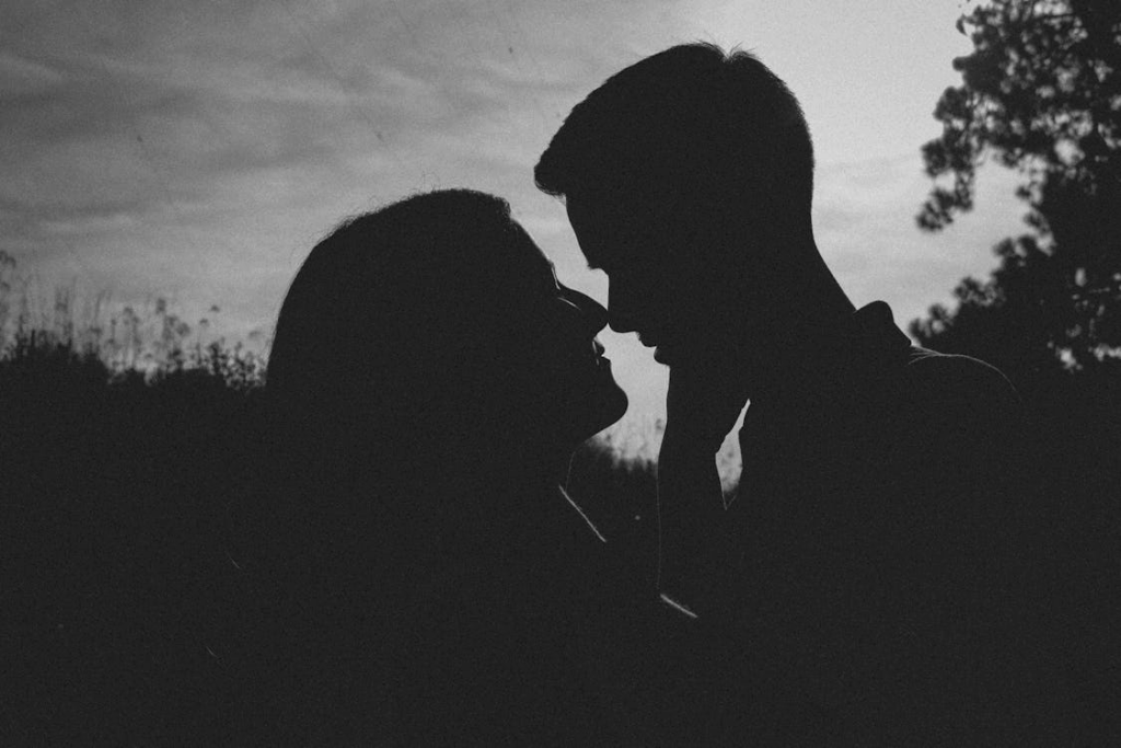 Black and white couple about to kiss