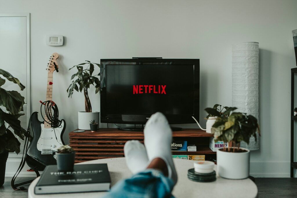 black flat screen tv turned on displaying 11
