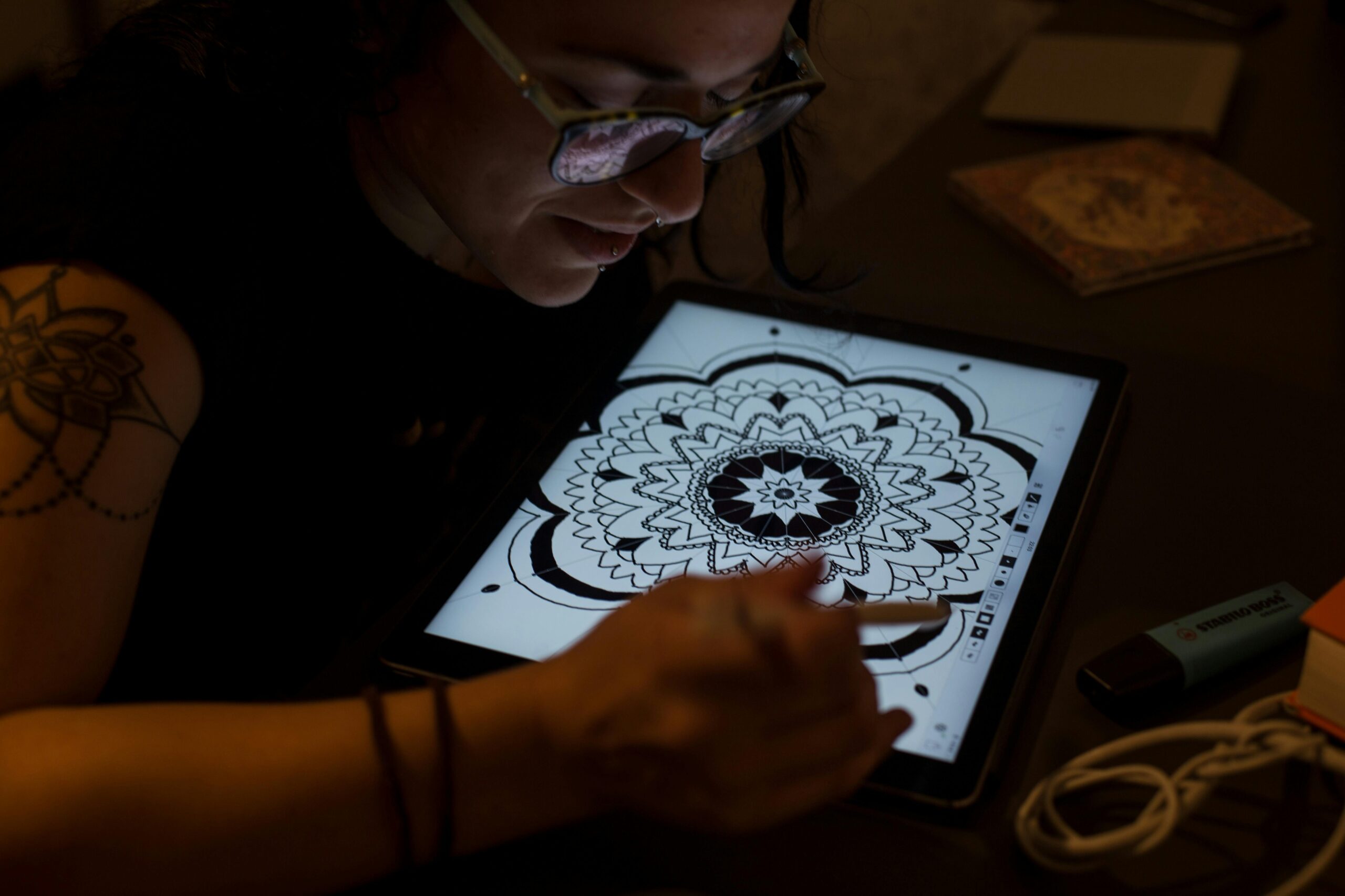 Woman Draws Mandala in Tablet Computer
