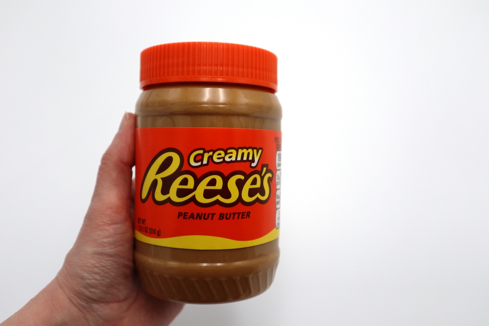 Norway 7 december 2023: Creamy Reese's Creamy Peanut Butter Jar brand product for bread spreading food toppings import from America USA isolated on white background