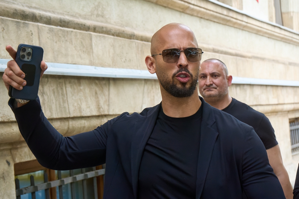 Bucharest, Romania. 30th May, 2024: Andrew Tate (L) and his brother Tristan Tate (not in picture) leave the Bucharest Court of Appeal.
