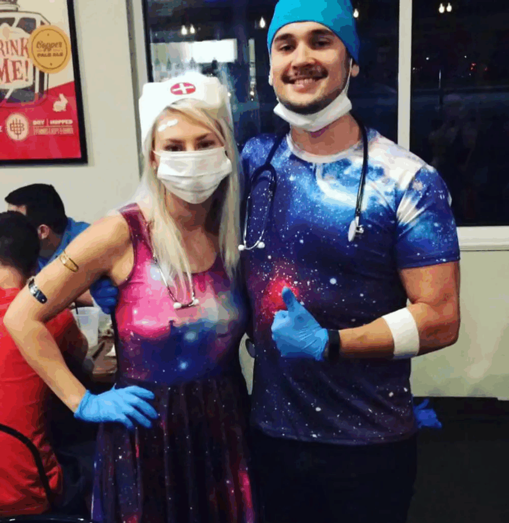couple wearing galactic-themed outfits