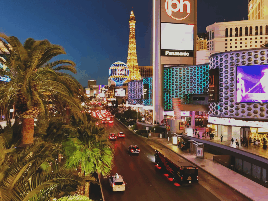Caption: The Las Vegas Strip is a stretch of resorts, casinos, and entertainment venues that showcase the city’s nonstop nightlife and tourism economy. Image Credit: Unsplash