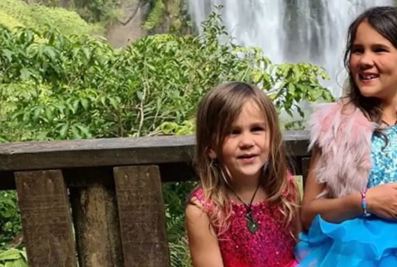 the children sitting on a bench