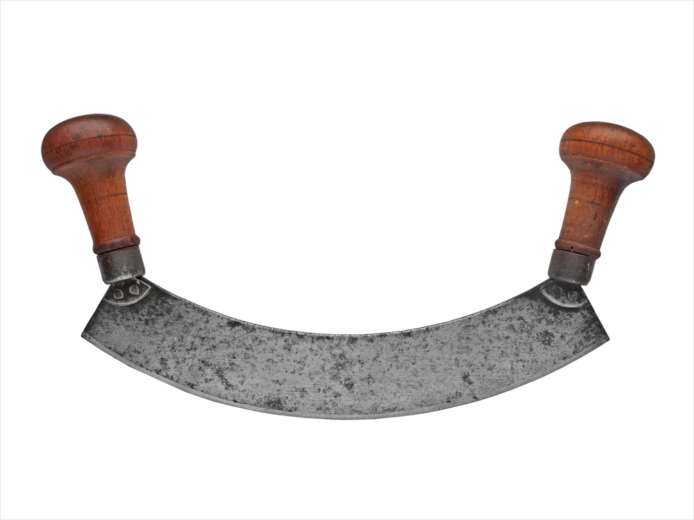 vintage french style herb chopper isolated over white background, clipping path