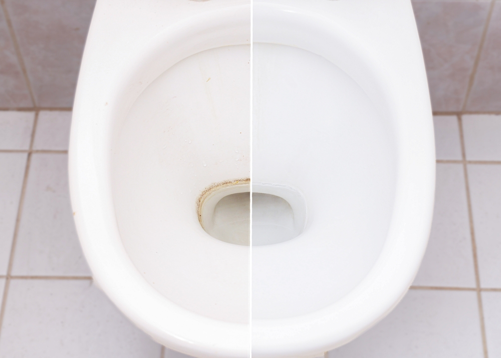 Comparison Toilet bowl before and after cleaning in bathroom. Toilet bowl with hard stain difficult to clean.