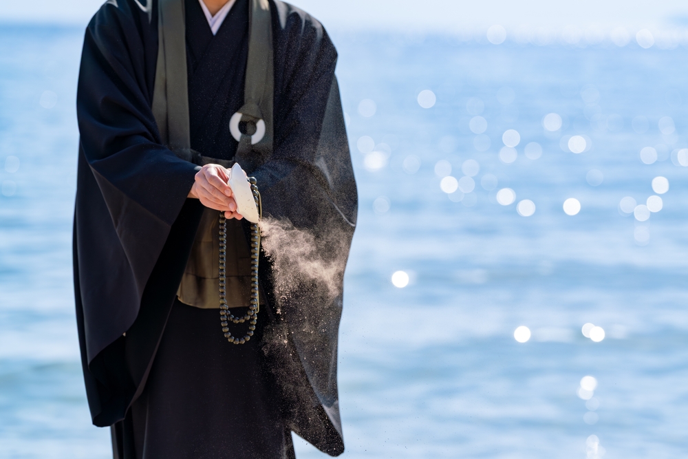 The image of the ashes that the monk prays for is scattered in the ocean