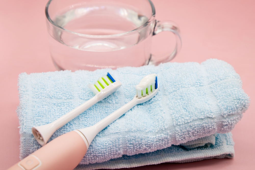 Daily toiletries fur towels cups toothbrushes