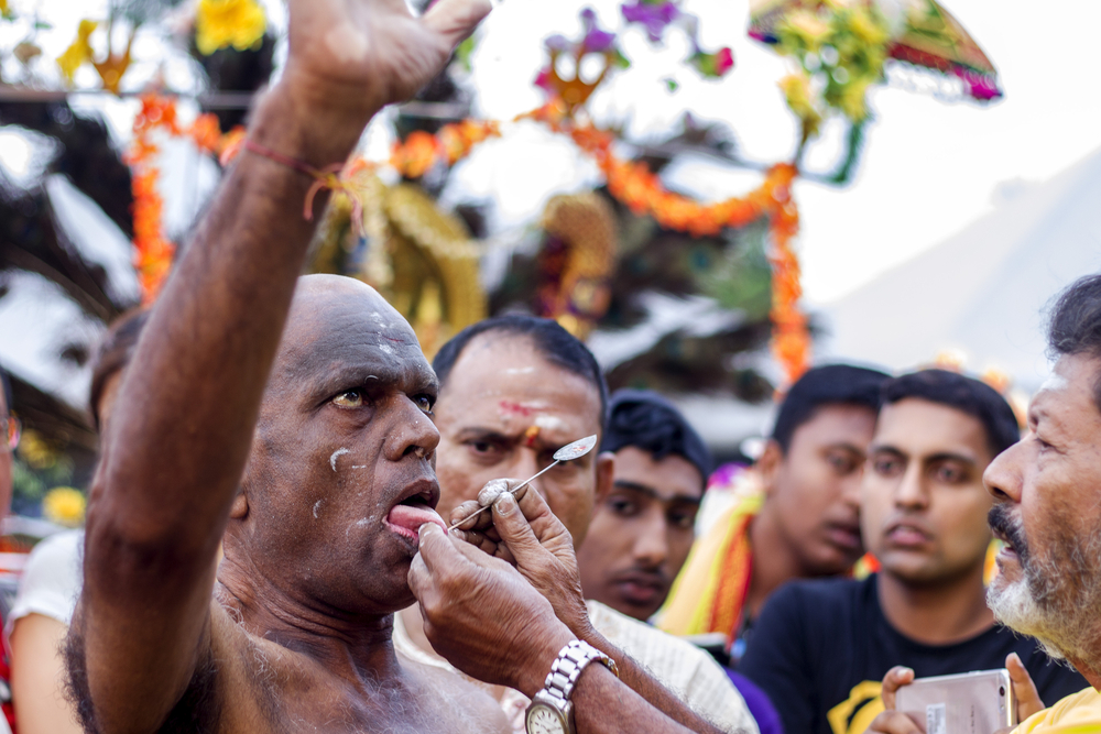Feb 9, 2017, Kuala Lumpur, Malaysia -During Thaipusam festival in MAlaysia, Hindu Devotees preparing prayer blessing ceremony by piercing tounge to fulfill their vows and offer thanks to the deities.