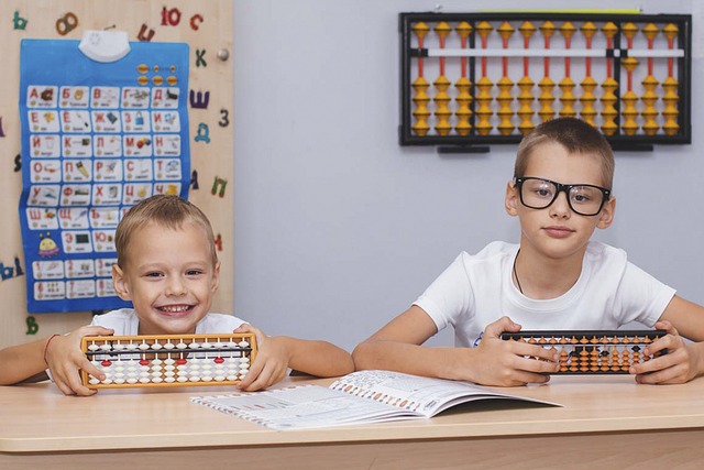two students with abacus