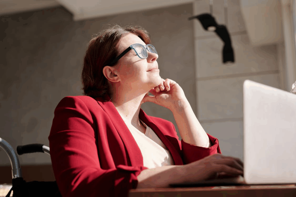 Woman in Red Blazer Wearing Green Framed Eyeglasses