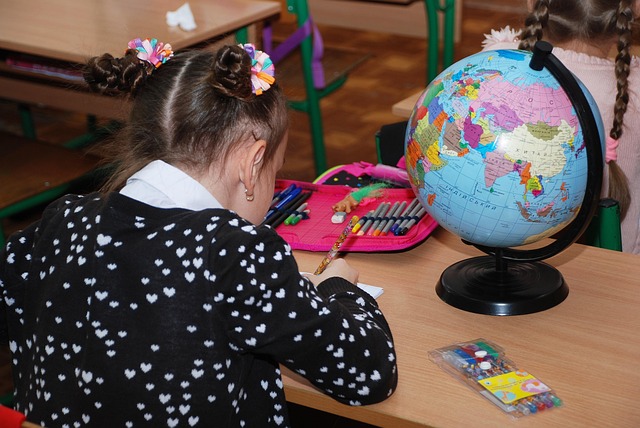 a child working at a desk