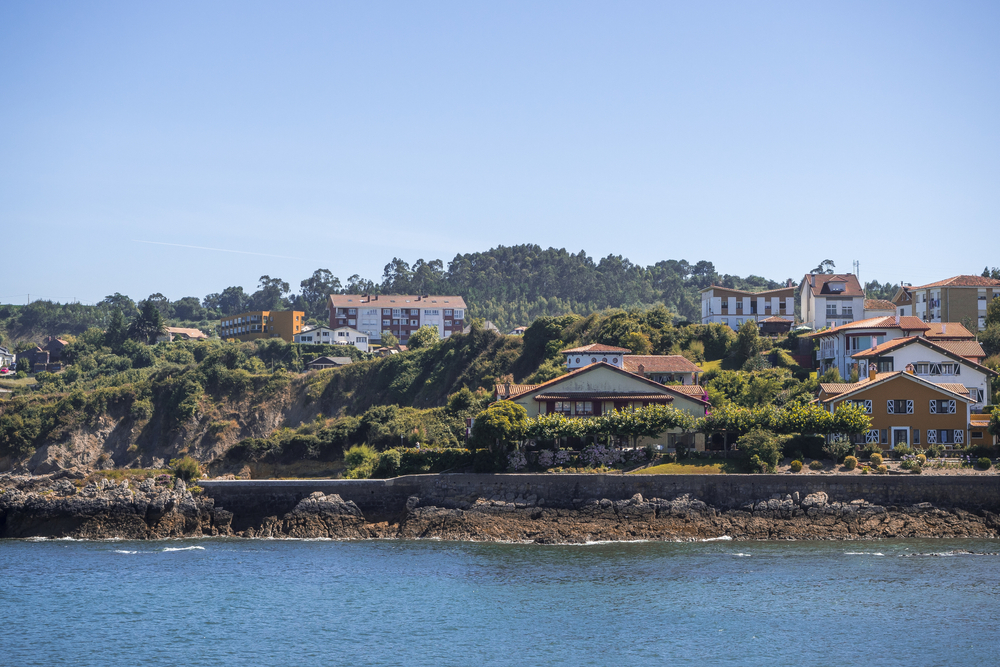 The colorful cozy houses along the ocean captured in Spain