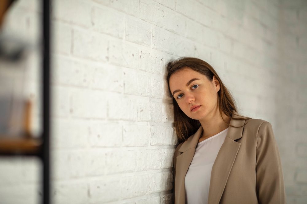 woman, burnout from work stress, over time and mental health fatigue problem. worker, tired and unwell while suffering from bad migraine, anxiety and exhaustion