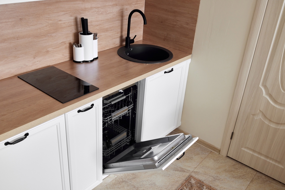 Modern kitchen design highlights sleek appliances and a minimalist aesthetic for style and function