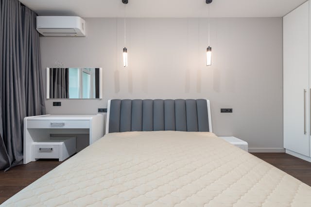 hotel bedroom with hanging lights