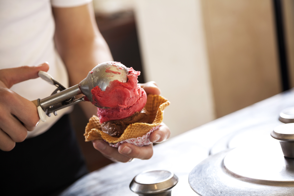 Cropped Image Of Waiter Serving Chocolate And Strawberry Ice Cre