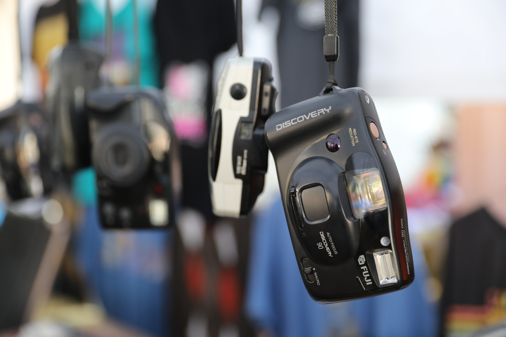 Los Angeles, CA - 02/22/2020:  Old photo cameras hanging for sale at the Famous Melrose Trading Post where range of vendors selling antiques, vintage goods & collectibles.