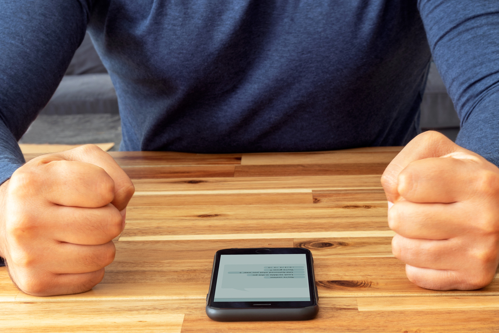 First reaction of a man who exposed to cyber bullying.