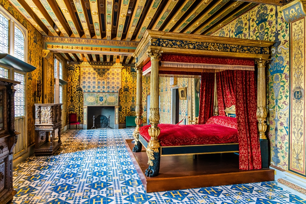 Blois, Loire Valley, France - May 2018: Medieval bed chamber in a castle; king's bedroom in royal castle of Blois