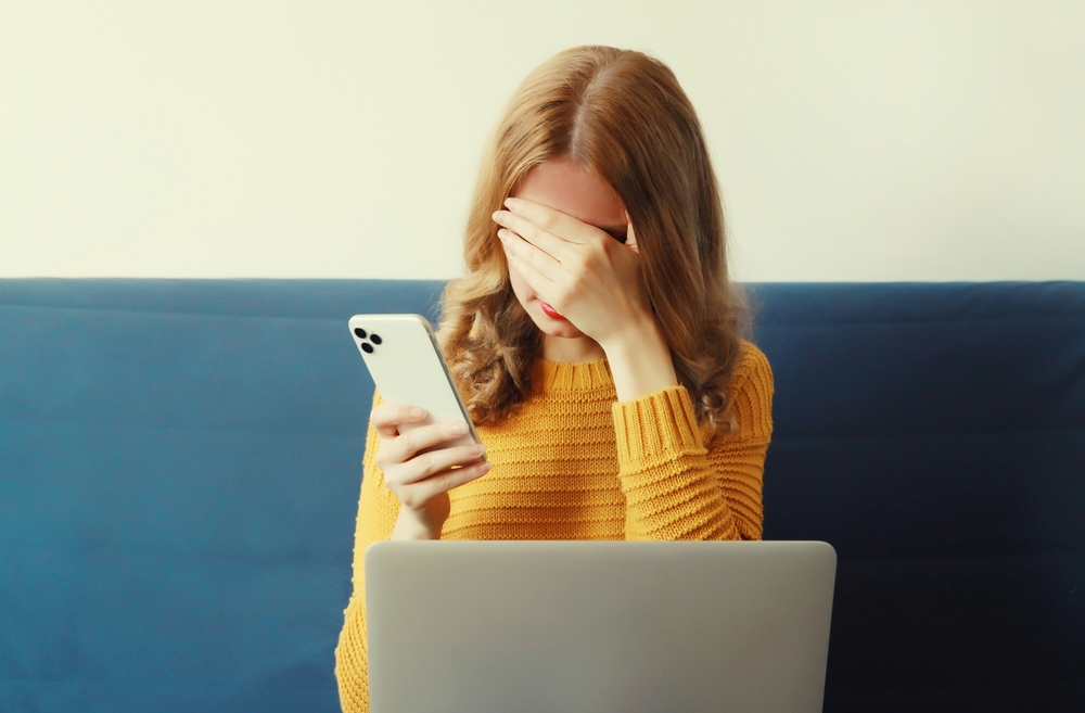 woman upset paying fees