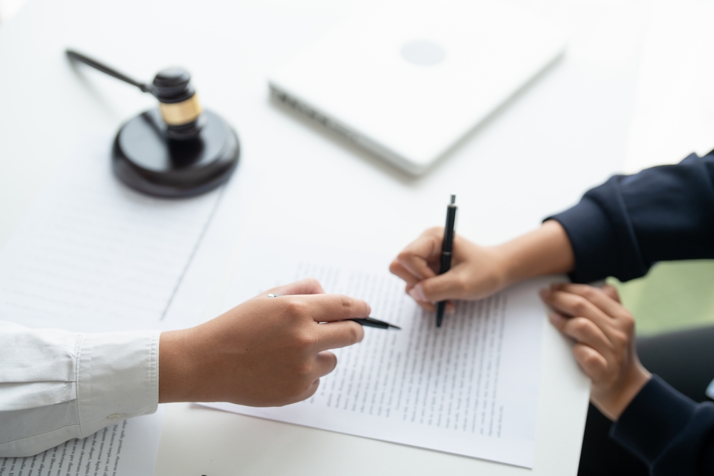 Lawyer businessman working with lawbook in office or courtroom Legal counsel with gavel and legal law. justice and lawyer concept Judge gavel hammer on Lawyer desk