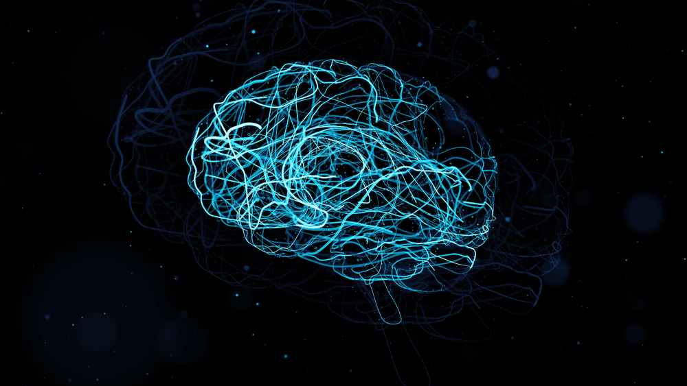 3d render of brain form with a lot of particles. Particles follow brain surface and left trails that symbolize neurons. Side view.