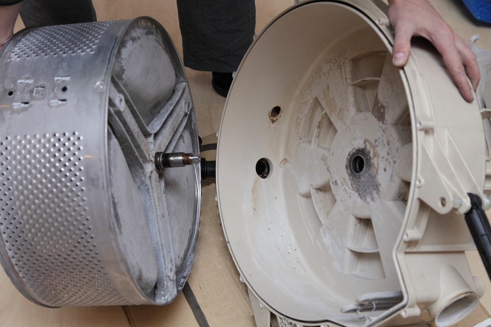 Front load washing machine drum box disassembly when bearings repair