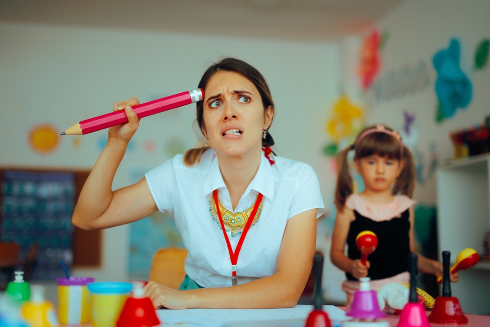 
Puzzled Art Teacher Feeling Confused at School
Stressed. Tired stressed kindergarten tutor forgetting something 
