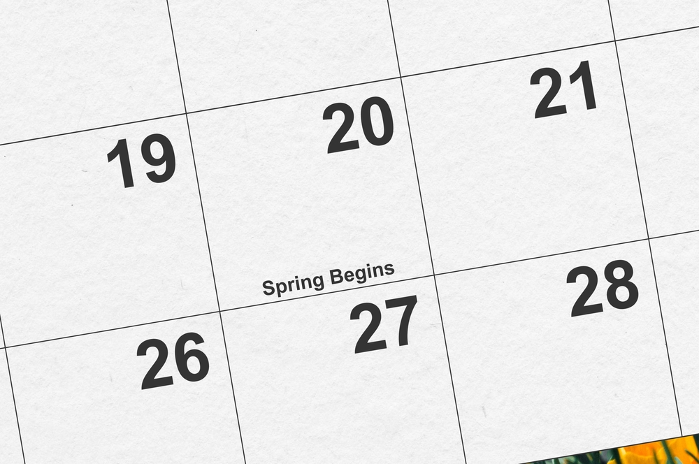 Spring begins March 20th on a 2025 calendar close up