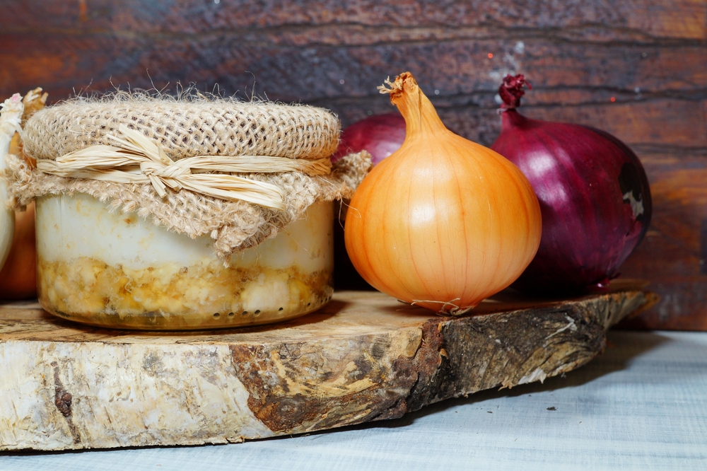 rural lard and cracklings in a jar, onion and cucumber