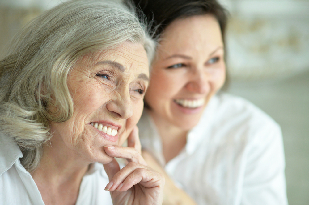 older woman with younger woman, talking