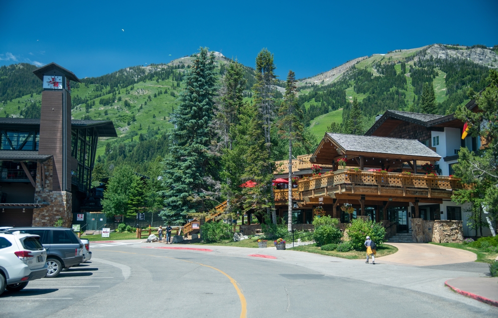 JACKSON HOLE, WY - JULY 12, 2019: Teton Village with town and mountains