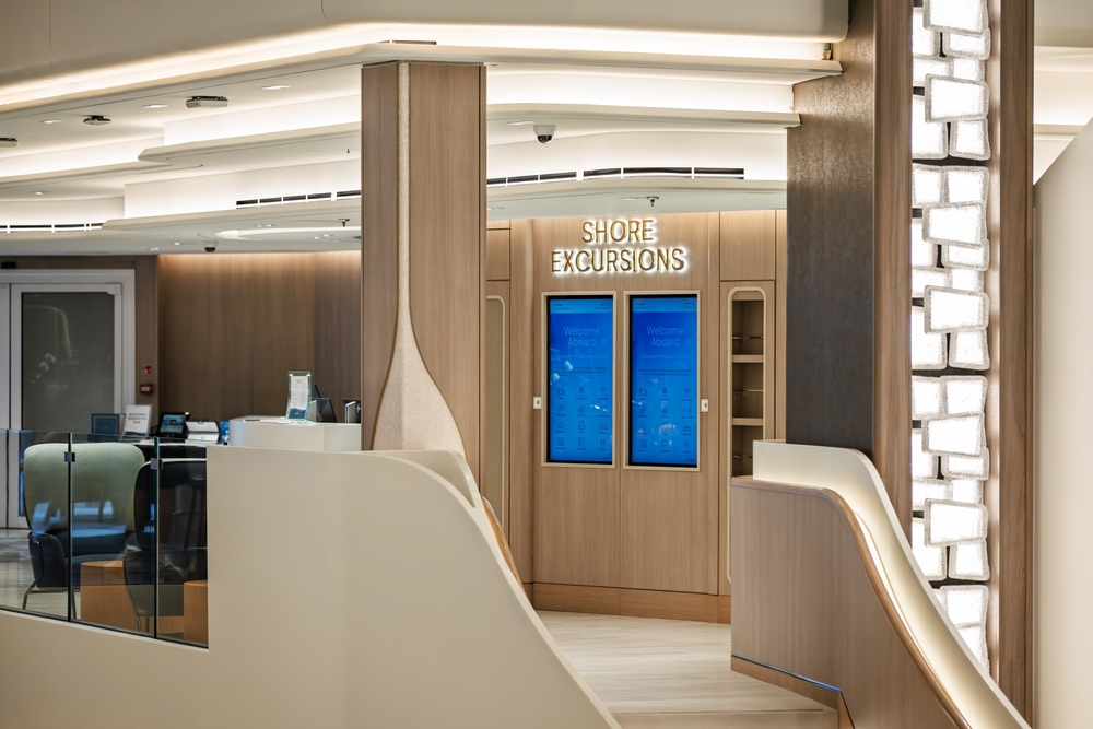 Mediterranean Sea - October 4 2025: Interior view of the Shore Excursions desk on the Norwegian Viva cruise ship.