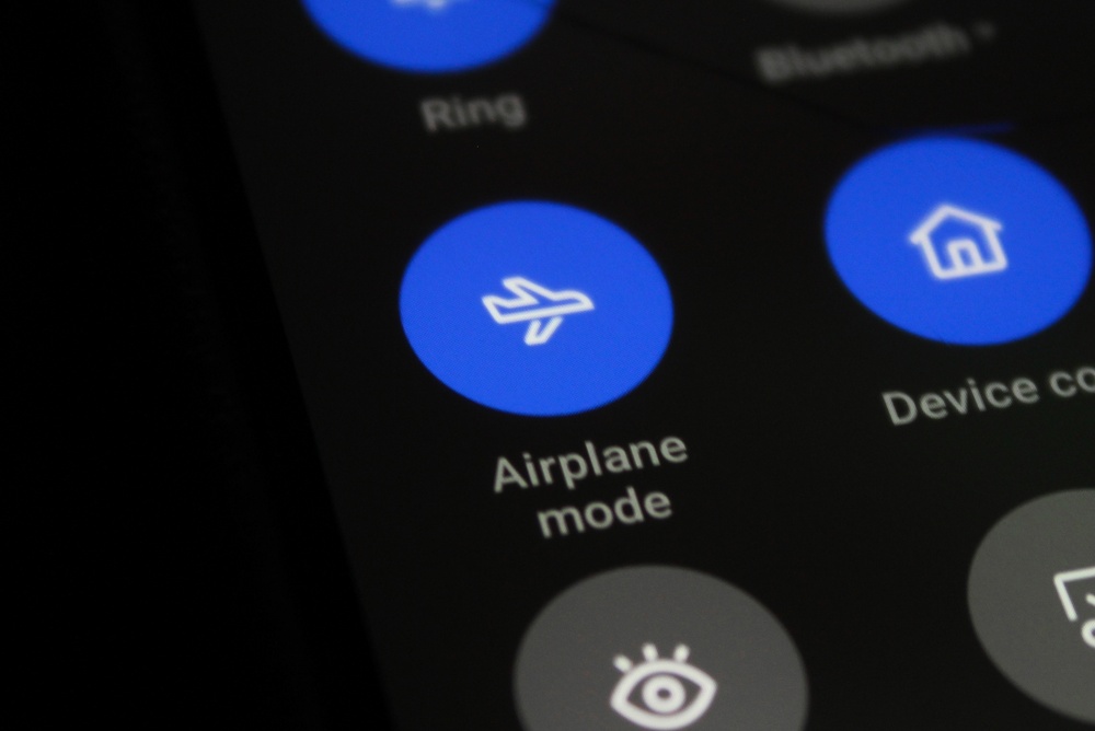 A close-up of a phone screen showing the Airplane Mode icon on the screen. Indonesia - July 30, 2025
