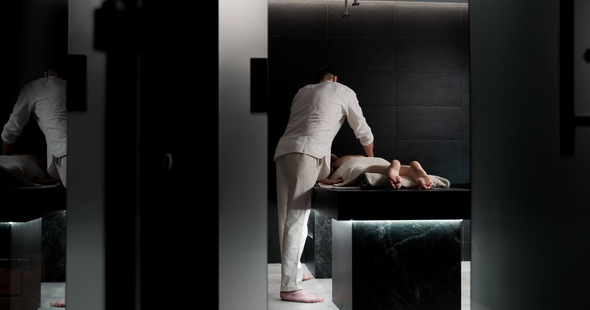 A relaxing massage in a modern spa room promoting wellness and self-care.