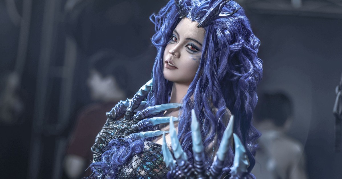 A captivating fantasy cosplay portrait featuring a character with purple hair, horns, and clawed hands, showcasing intricate design and creativity.