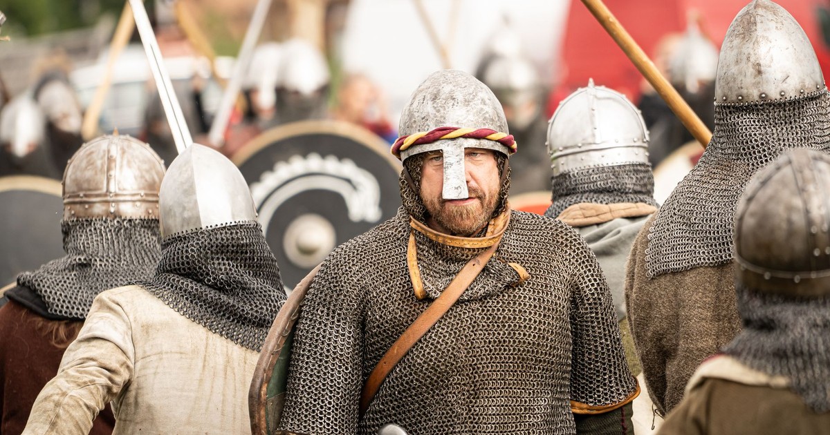 Viking reenactors in historical armor at a medieval festival in Szczecin, Poland.