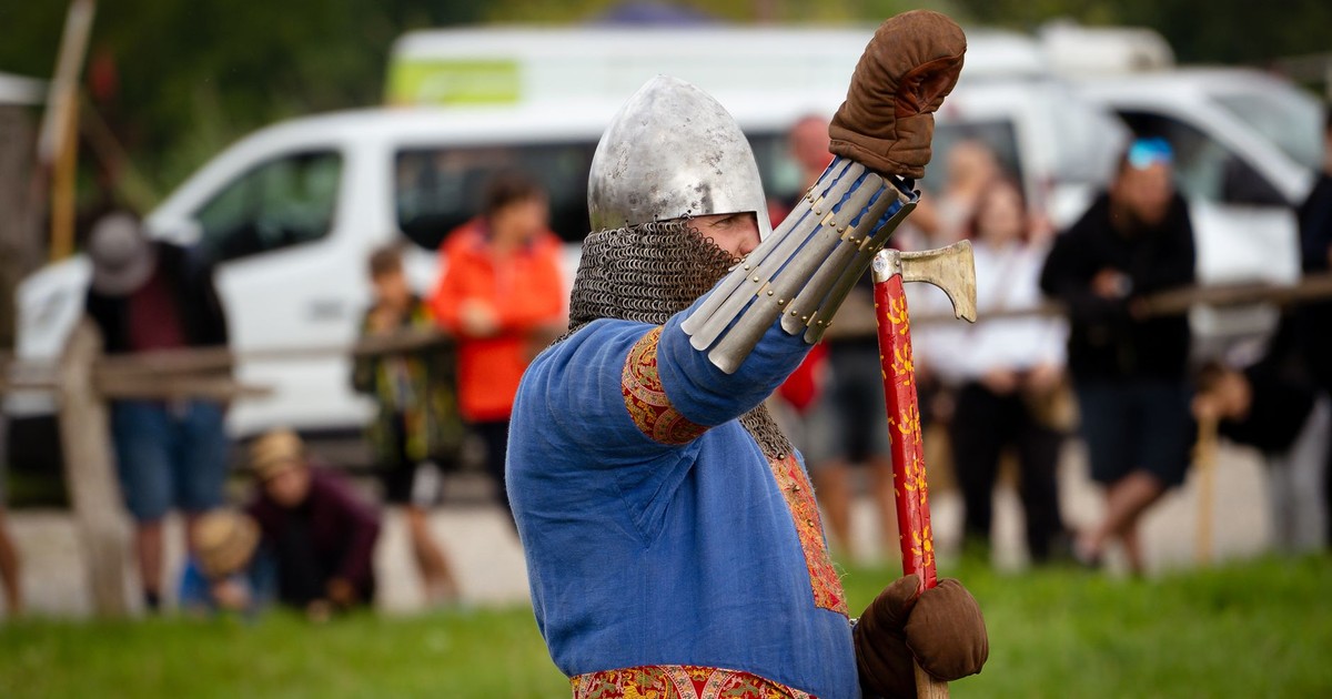 A Viking reenactor in armor at a historical event in Szczecin, Poland.