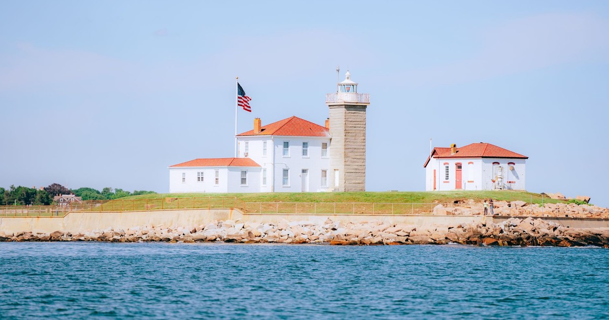 Scenic view of Watch Hill Lighthouse on a sunny day in Rhode Island, USA.