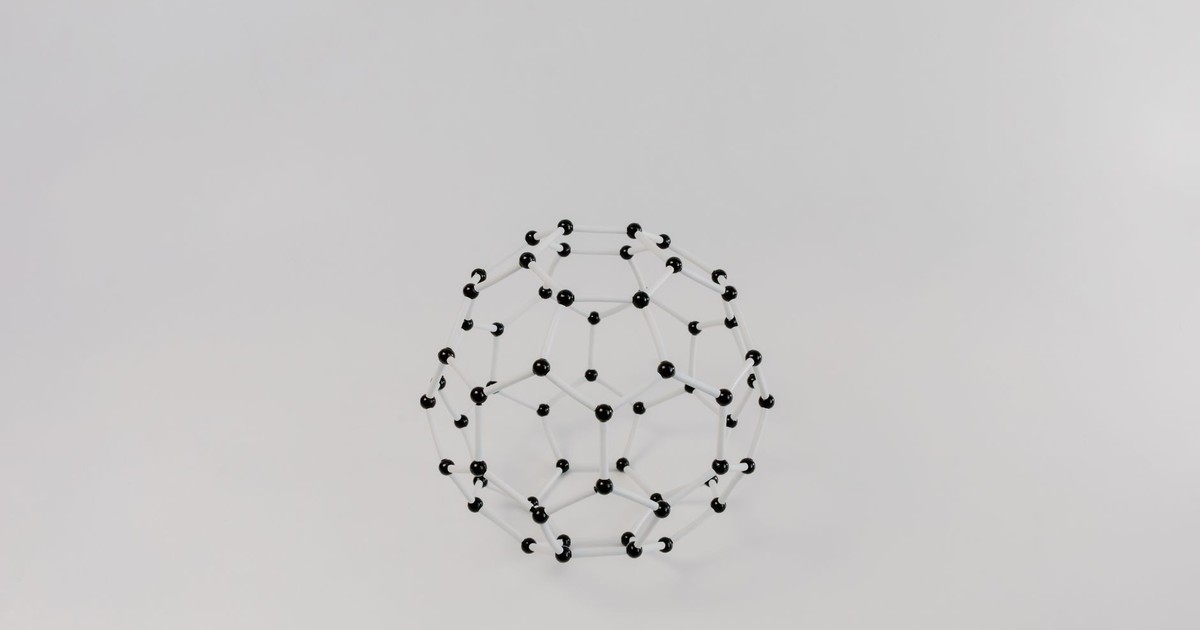 Abstract geometric molecular model with hexagons on white background.