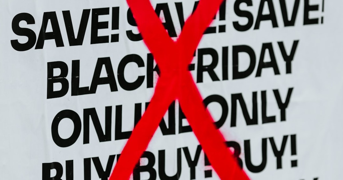 a sign with a red and white text