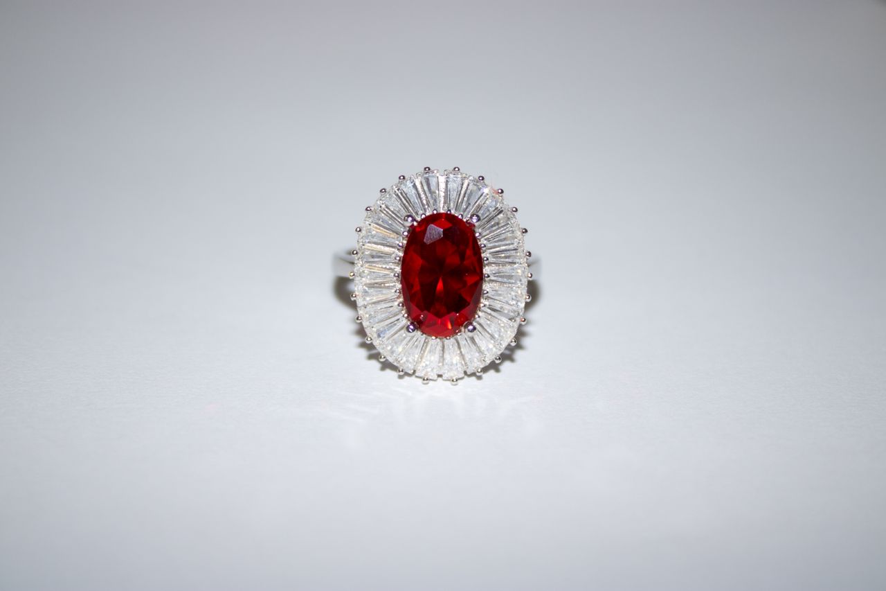 red gem in ring