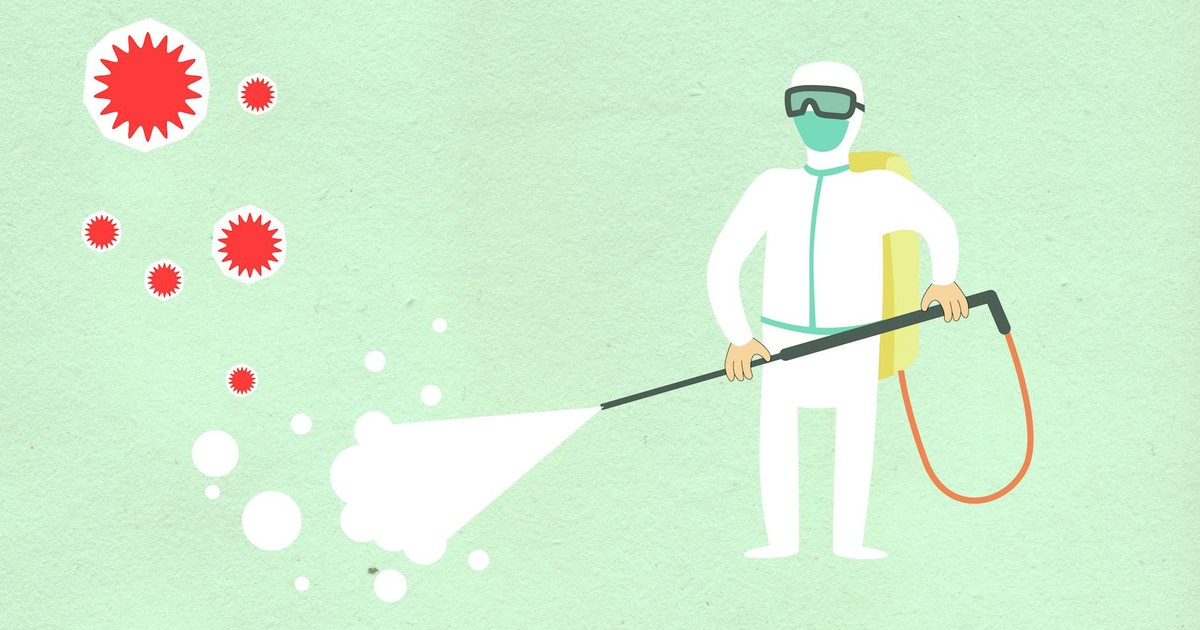 Decorative paper appliques of cleaning person in protective equipment spraying disinfectant during COVID 19 pandemic on green background