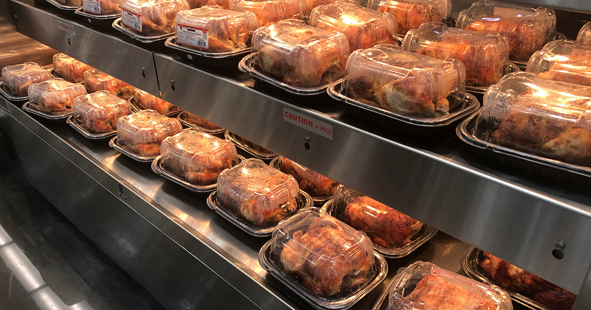 Los Angeles, CA/USA 11/25/2019 Kirkland brand seasoned rotisserie chickens for sale at a Costco Mega Discount Store